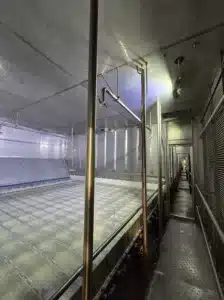 Patatfabrikant-droogoven uitgerust met SN35-35HT LED-armaturen in 316L roestvrijstaal van JEL Products voor constante hittebestendigheid.