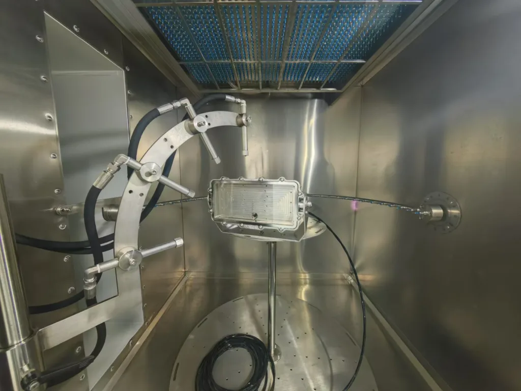 Snapper HT SS floodlight during an IP test in a test chamber